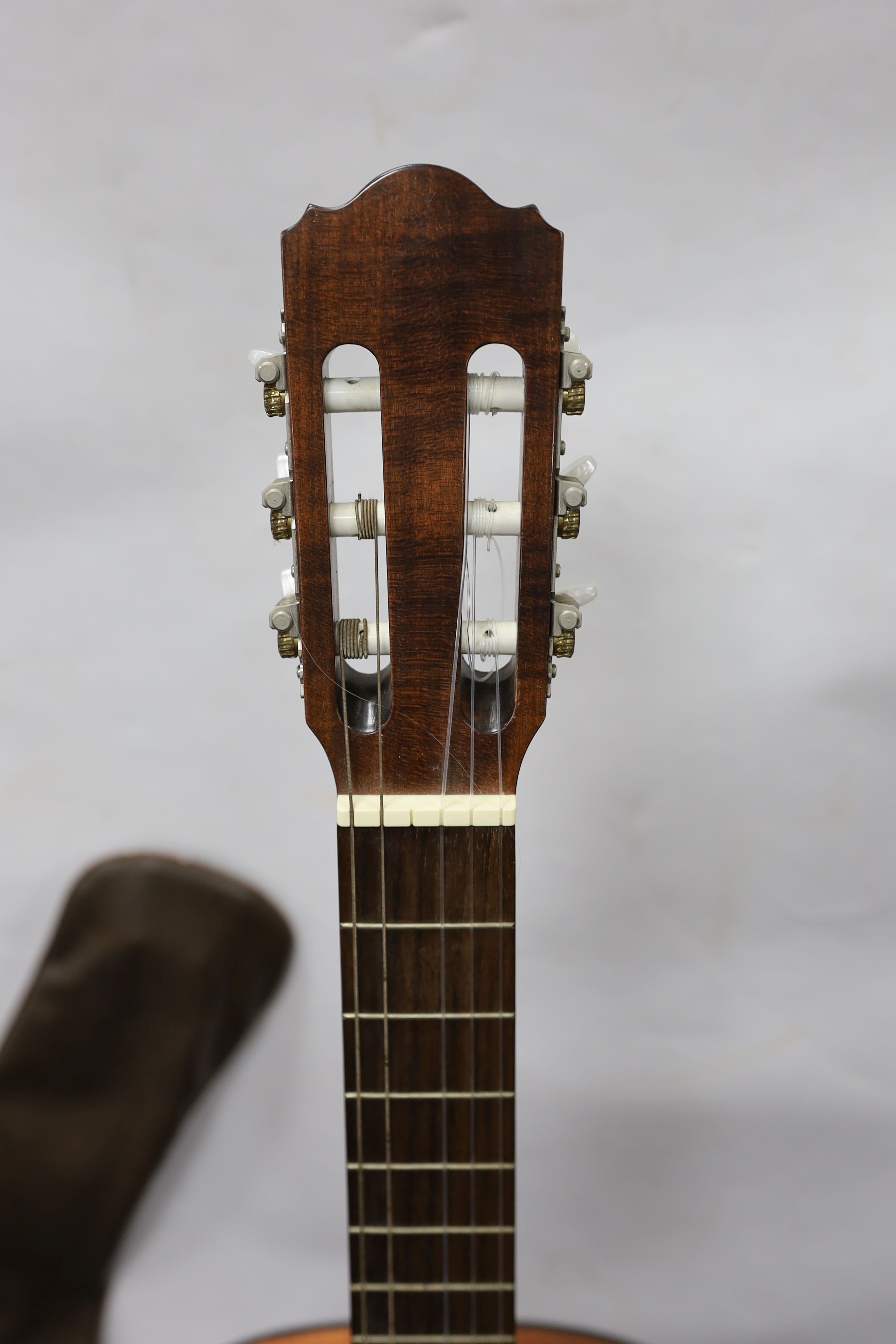 A Hokada classical guitar with case